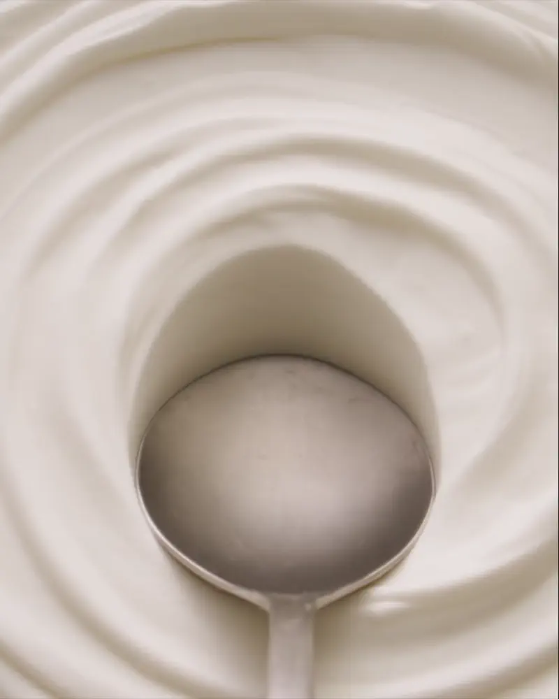 svg+xml;charset=utf - commercial photography studio Egypt Juhayna happy kitchen yogurt videography egypt - spoon in yogurt